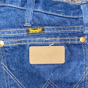 Wrangler Men's Dark Blue Denim Jeans with Tan Patch